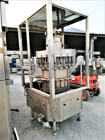 Riempitrice alto vuoto Ocim 3.000 bph Usata