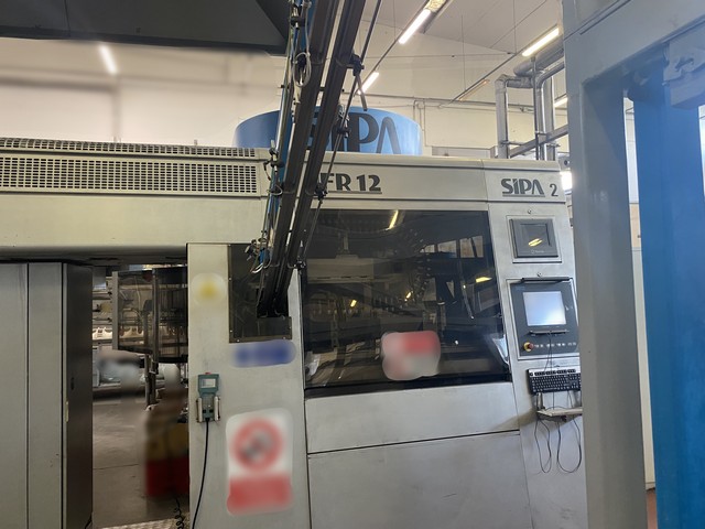 Linea di imbottigliamento PET 12.000 bph Usata 12