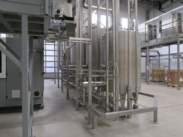 Linea di imbottigliamento Krones PET 24.000 bph Usata 23