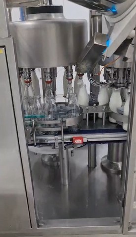 Linea di imbottigliamento per latte in vetro Usata 7