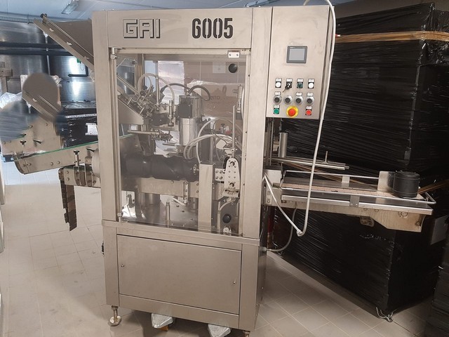 Gai capsuling machine with 2S adhesive labeller 4