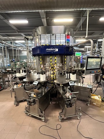 Used 5 adhesive station Makro labeller with 16 electronic cam-driven plates 21
