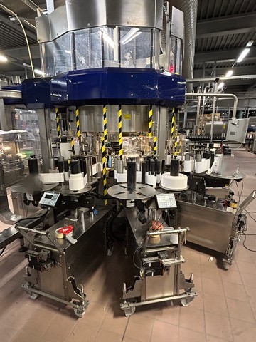Used 5 adhesive station Makro labeller with 16 electronic cam-driven plates 23