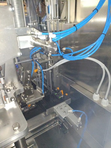 Monoblocco di riempimento per lattine usato Emma a gravità 2