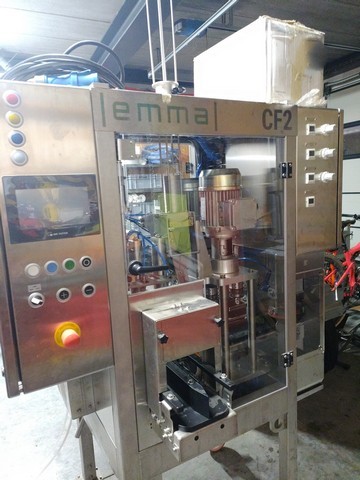 Monoblocco di riempimento per lattine usato Emma a gravità 6