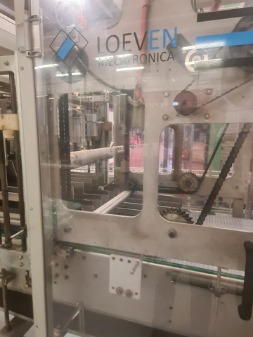 Used hot melt wrap Around Loeven 3