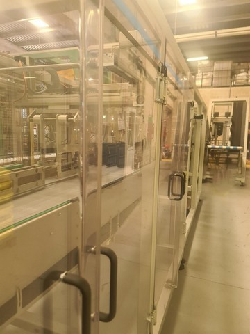 Used hot melt wrap Around Loeven 5