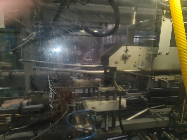 Used hot melt wrap Around Loeven 8