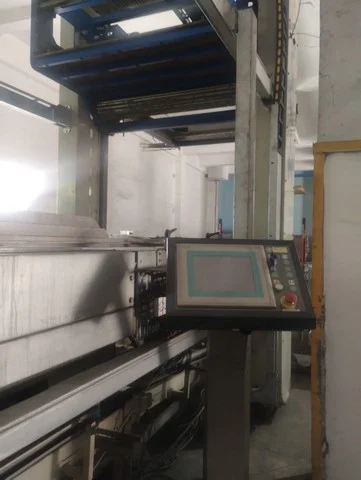 Used Sacmi palletizer with semi-automatic pallet wrapper